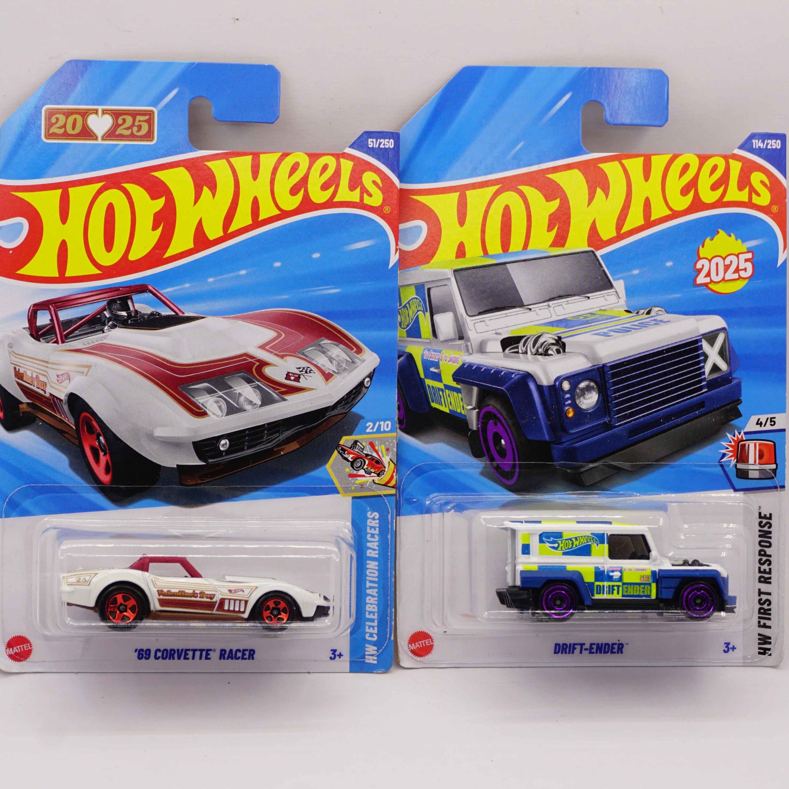 Hot Wheels Mainlines die-cast cars, featuring white '69 Corvette Racer and blue/yellow Drift-Ender fantasy first responder vehicle, 2025 releases at RACEiN PARC