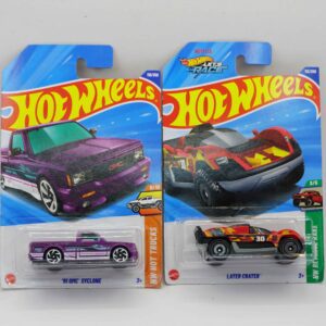Hot Wheels Mainlines die-cast cars, featuring purple '91 GMC Syclone pickup and red/yellow Later Crater fantasy truck, 2025 releases at RACEiN PARC