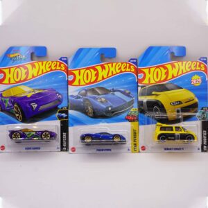 Hot Wheels Mainlines die-cast cars, featuring blue Pagani Utopia flanked by Nerve Hammer and Renault Espace F1 fantasy models, 2025 releases at RACEiN PARC